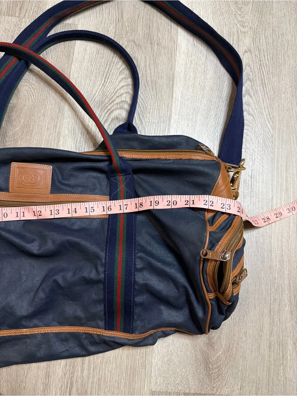 Gucci Navy Duffel Bag with Tan Leather Trim and Red-Green Stripe Webbing